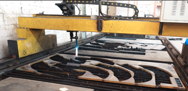 image of plasma cutter cutting steel for excavator rake