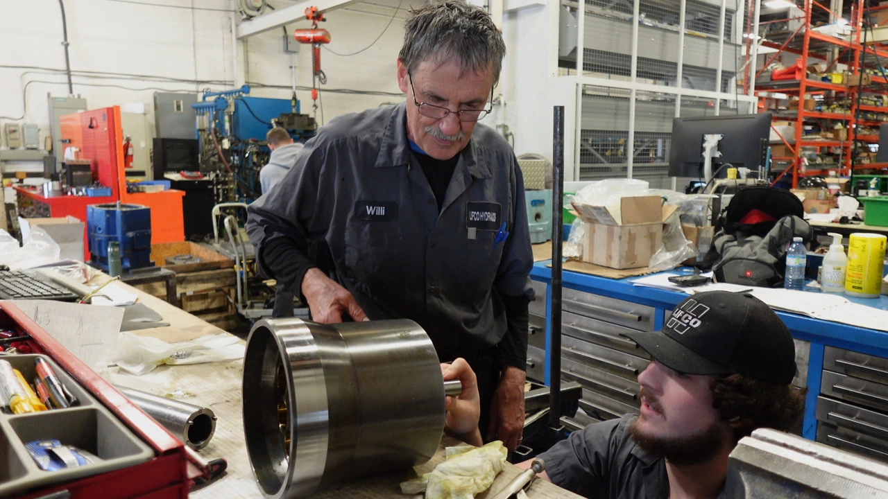 Willi teaching Trent some technical knowledge on a Gold Cup.