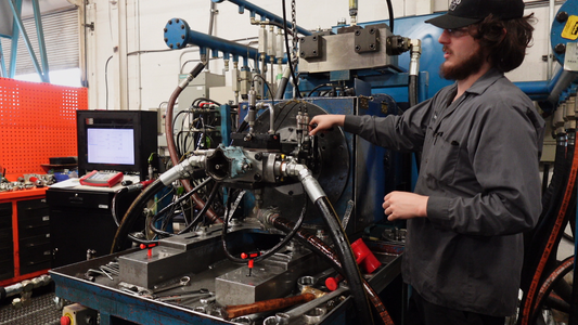 image of a lifco hydraulic technician using test bench